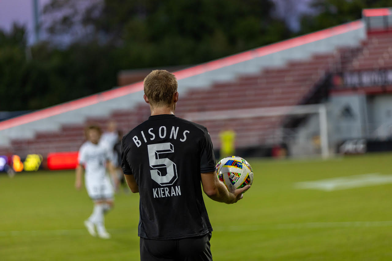 Cooper Kieran on the pitch in a Bisons jersey
